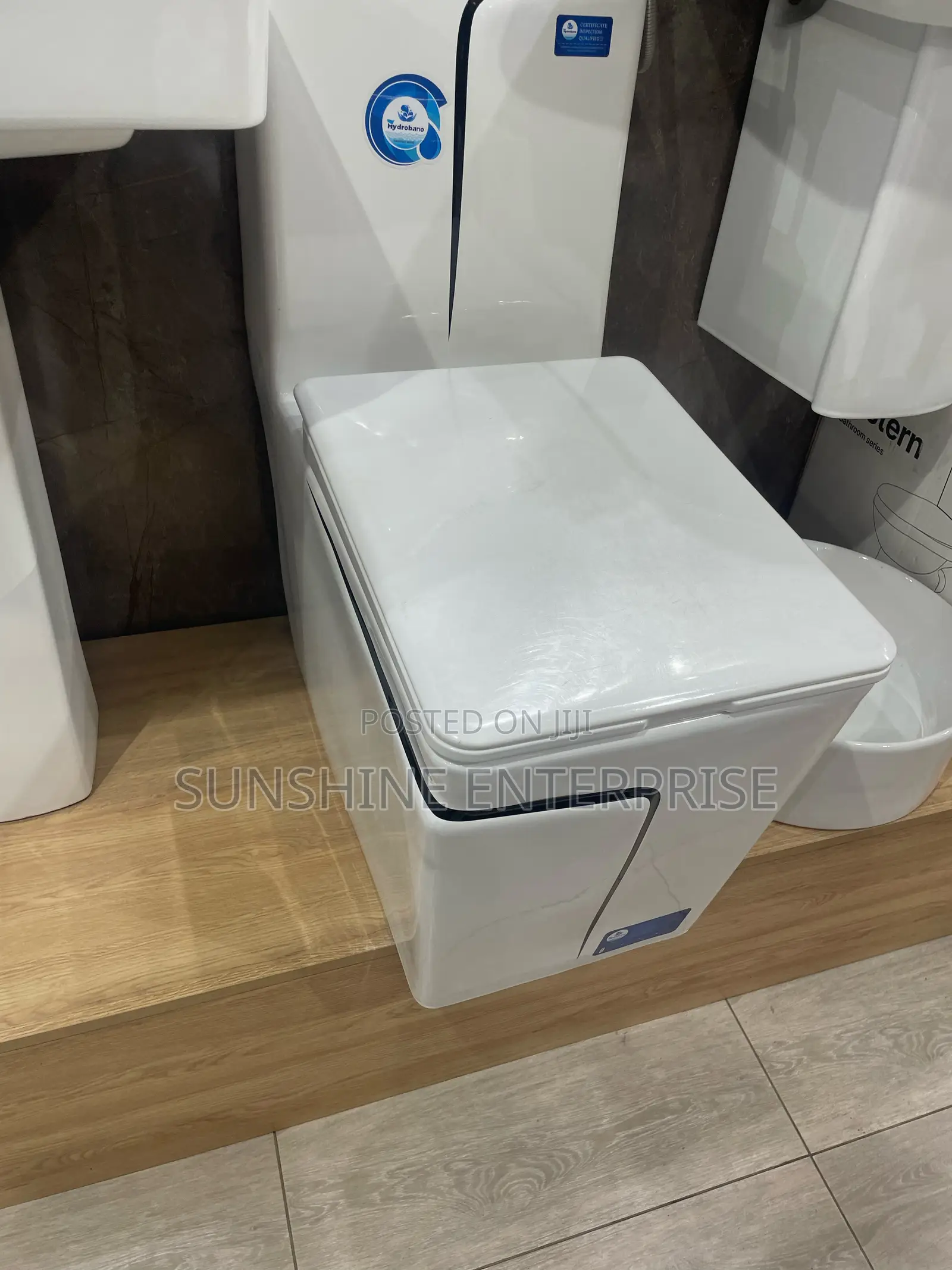 Black and White Water Closet With Wash Hand Basin and Stand