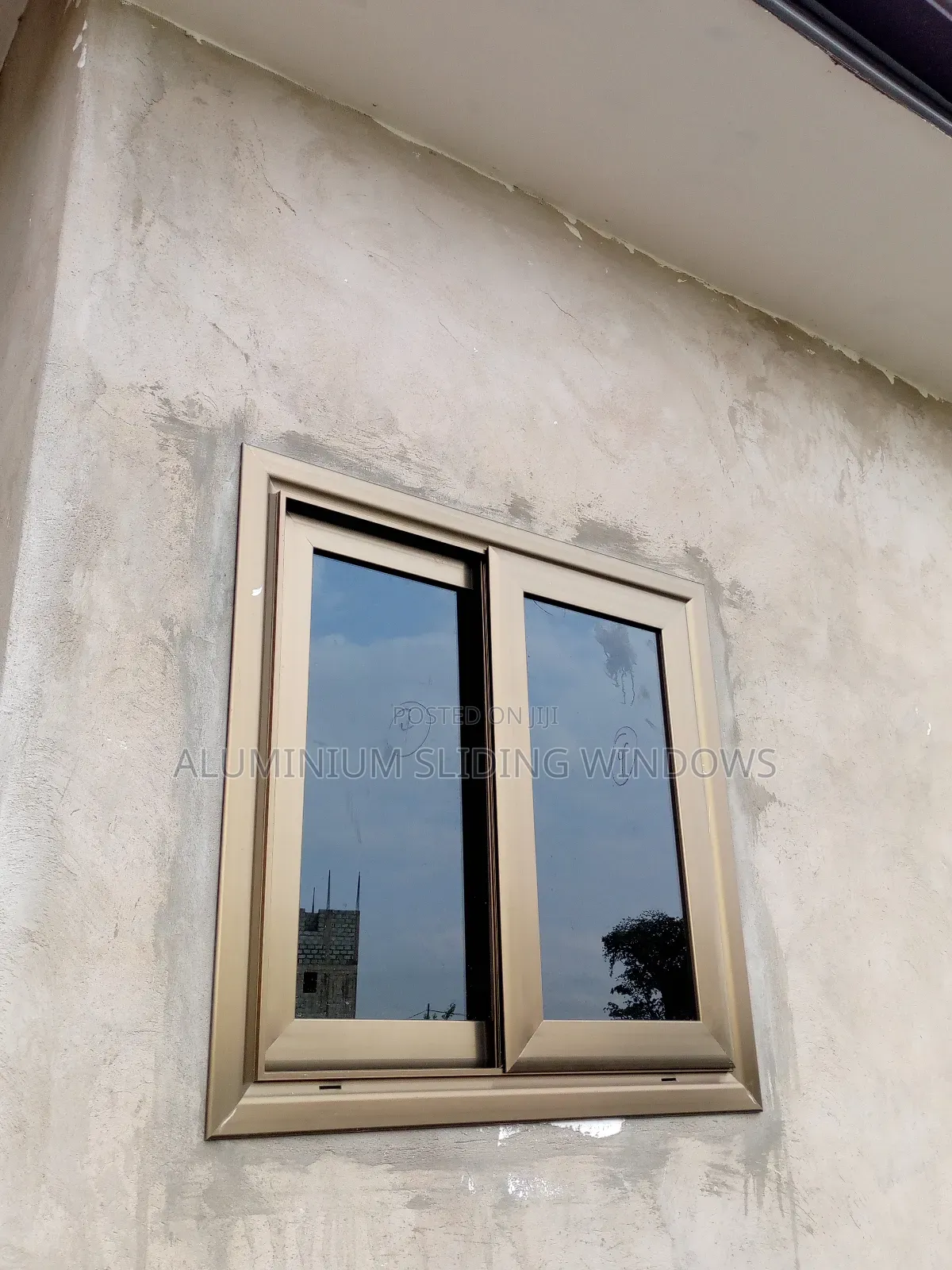 Aluminium Sliding Windows With Dark Tinted Glass and Net