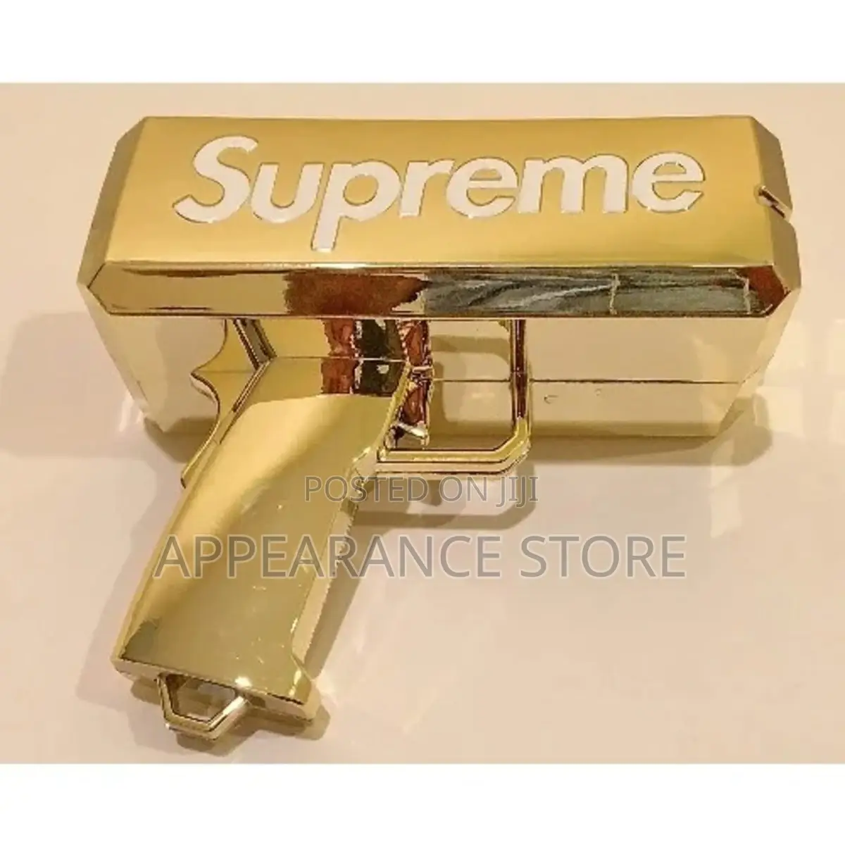 Supreme Money Gun Available as Seen
