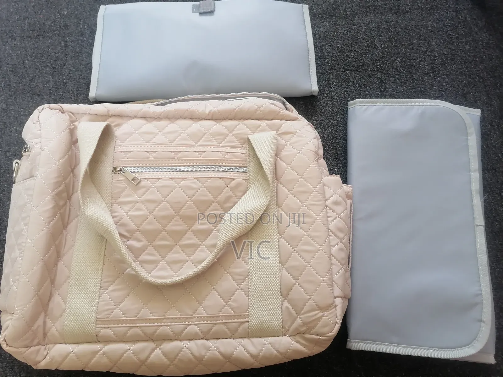 Maternity Diaper Bag With a Changing Mat