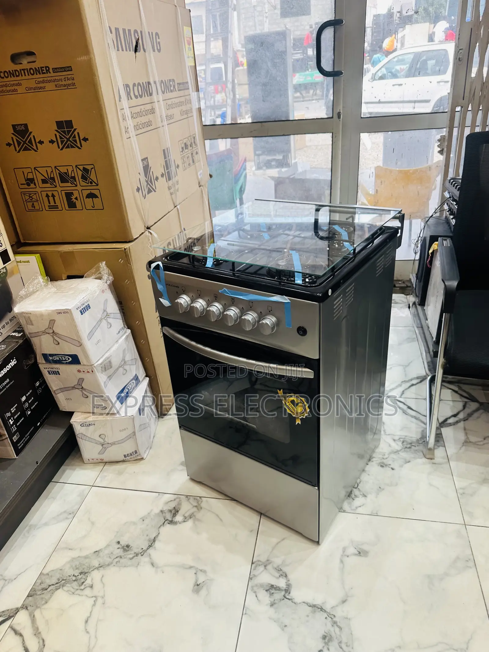 Available Now Grey 4burner Gas Stove 50/50 Call and Order