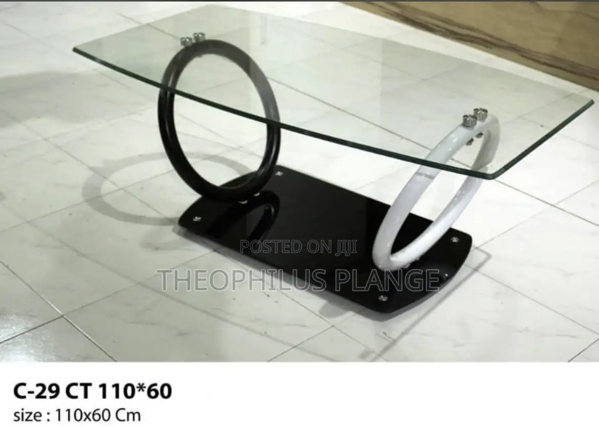 Glass Center Table With Ring Stand Design