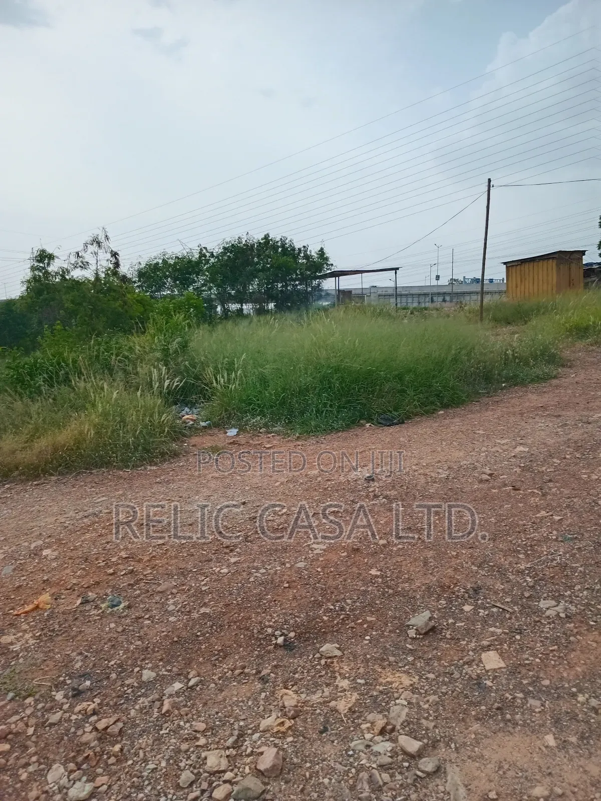 9 Acrs of Land at Pokuase Just by the Road for Sale
