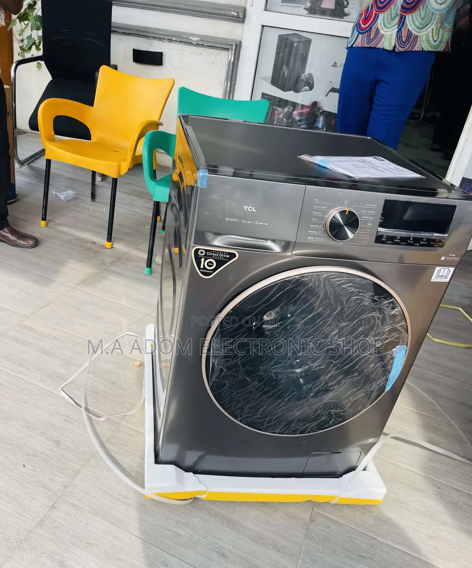 Effortless Cleaning TCL 10.5kg Front Load Washing Machine.