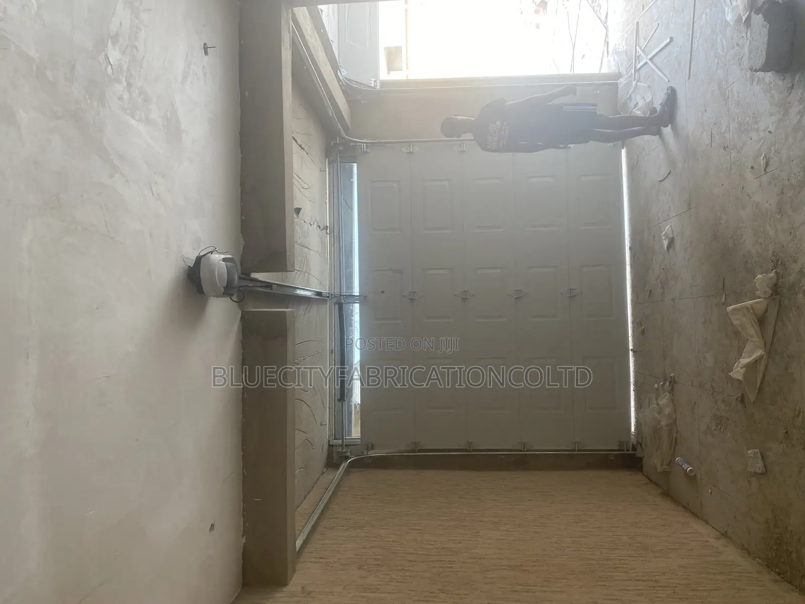 Automated Garage Door With Fanlight and Remote