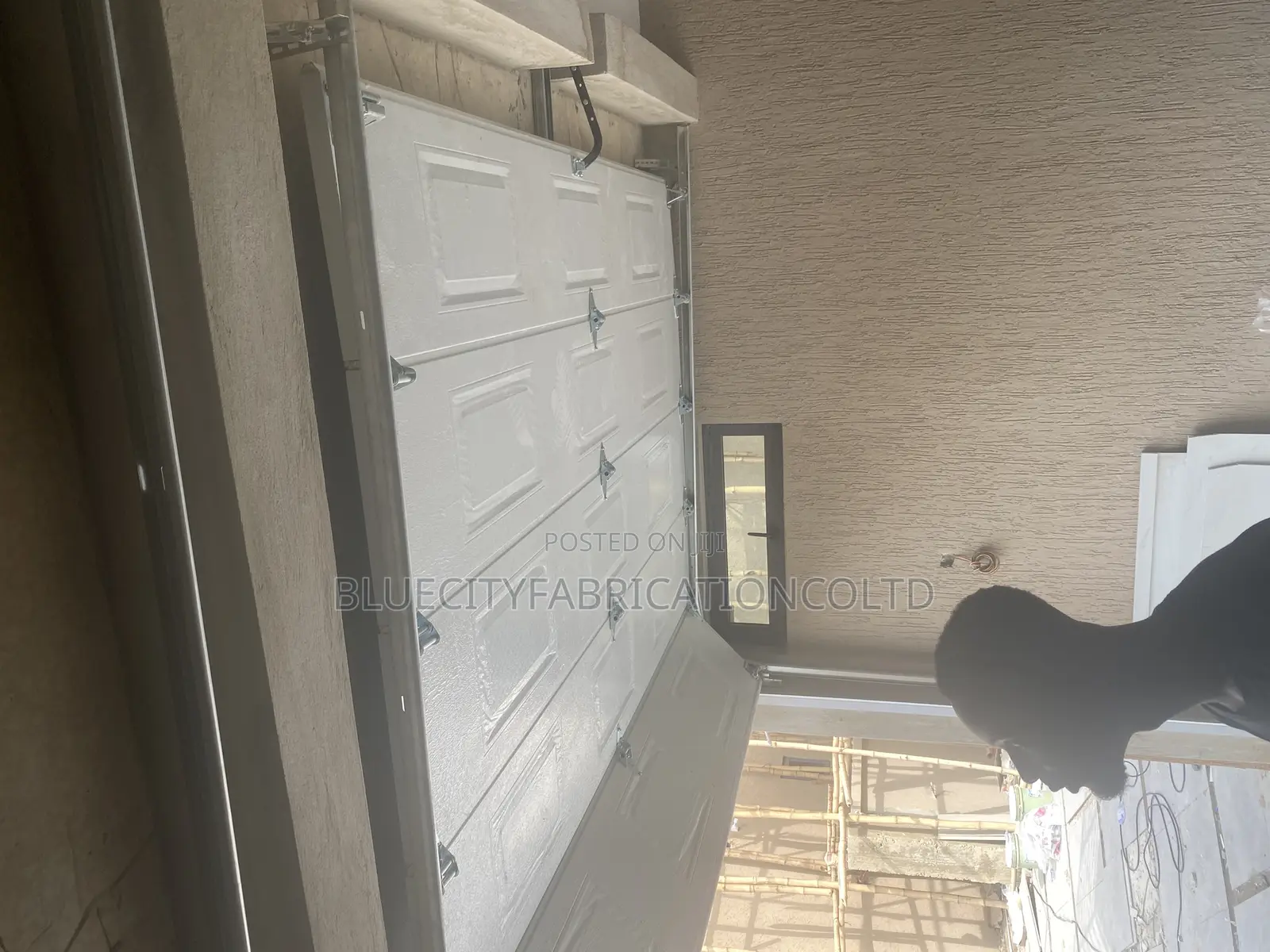 Automated Garage Door With Fanlight and Remote