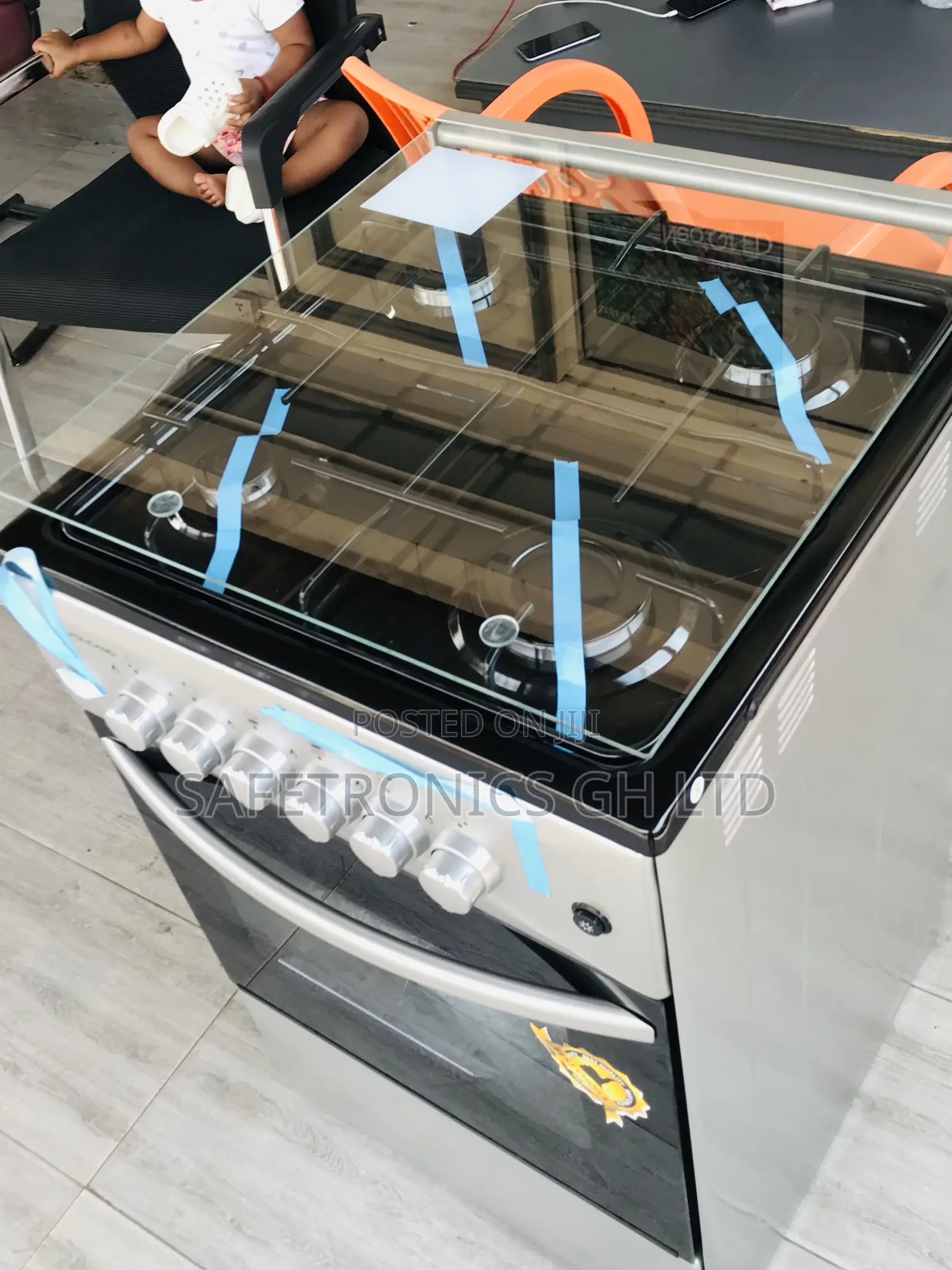 Available Gray Glass Lid 50/50 Oven 4 Gas Burner