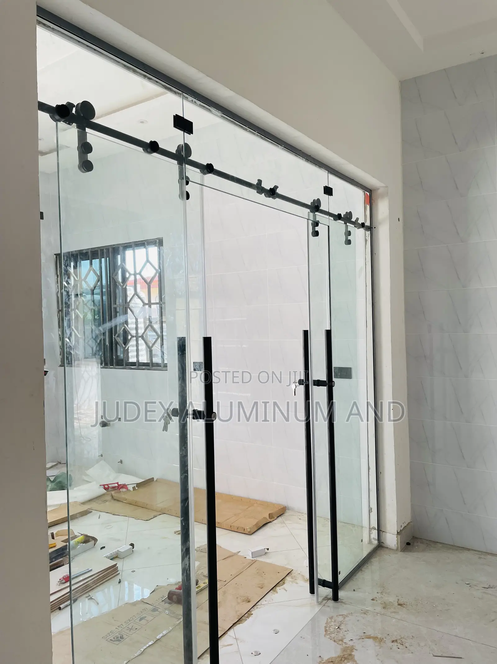 Frameless Double Sliding Doors With Black Accessories