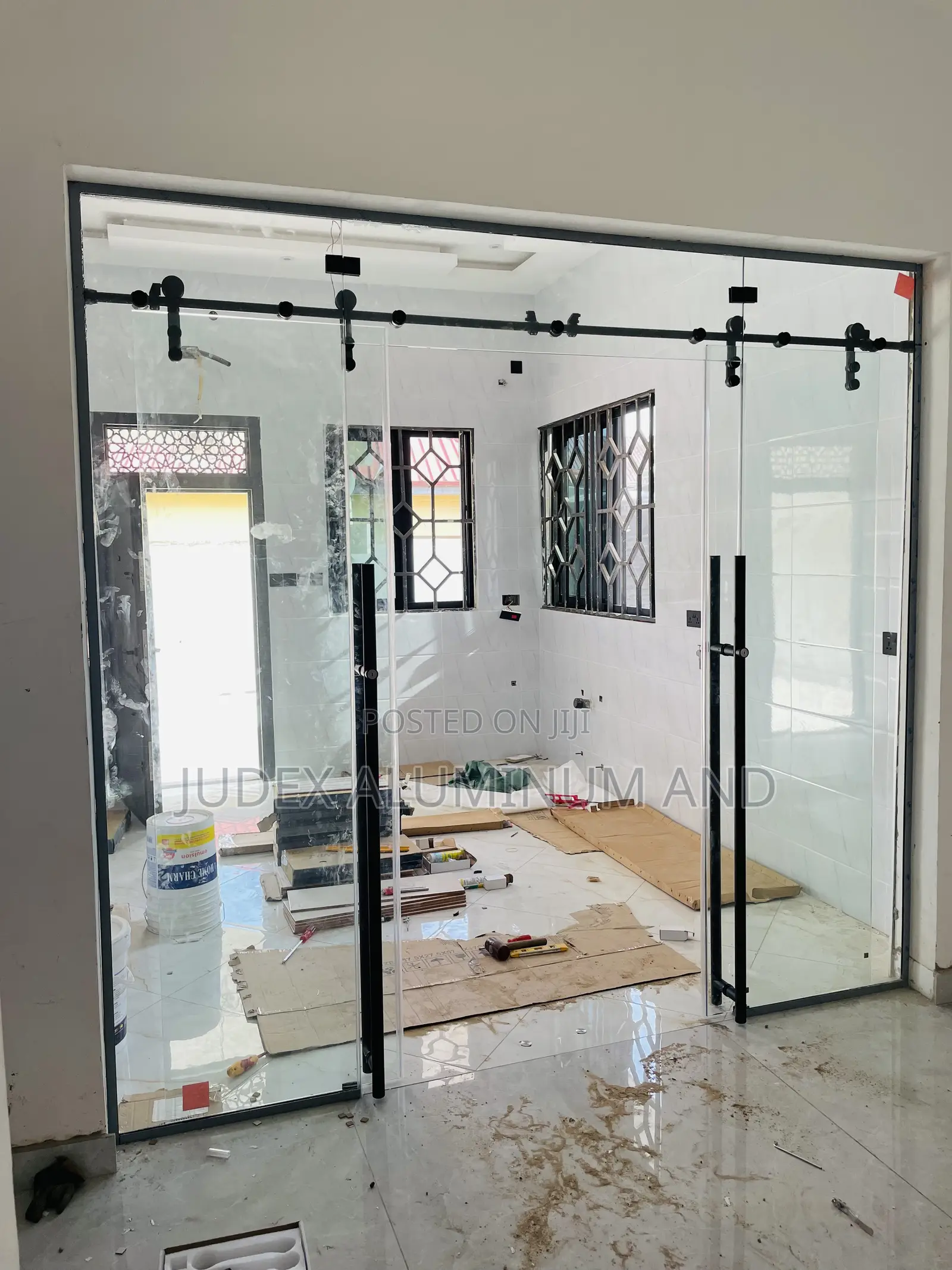 Frameless Double Sliding Doors With Black Accessories