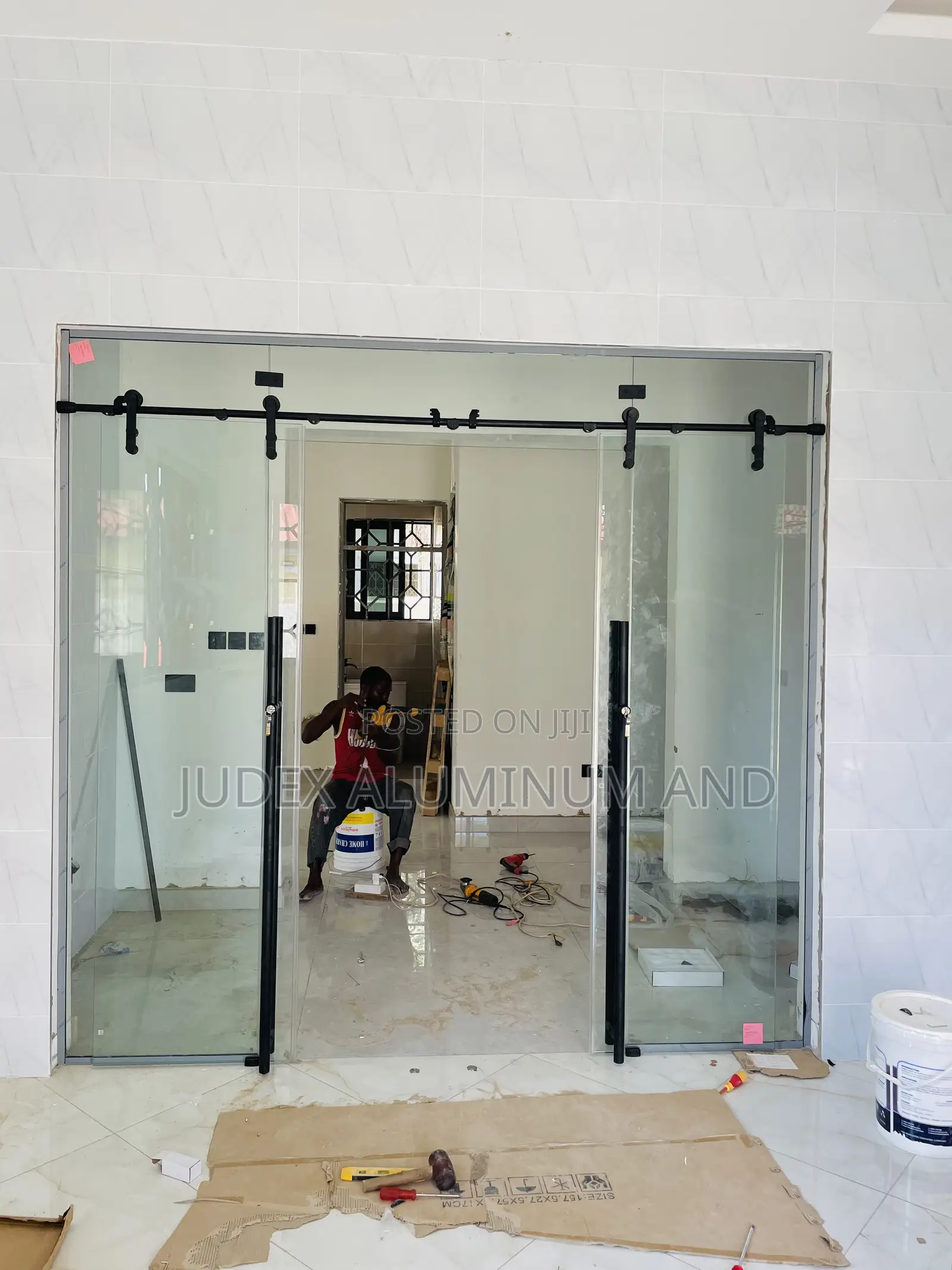 Frameless Double Sliding Doors With Black Accessories