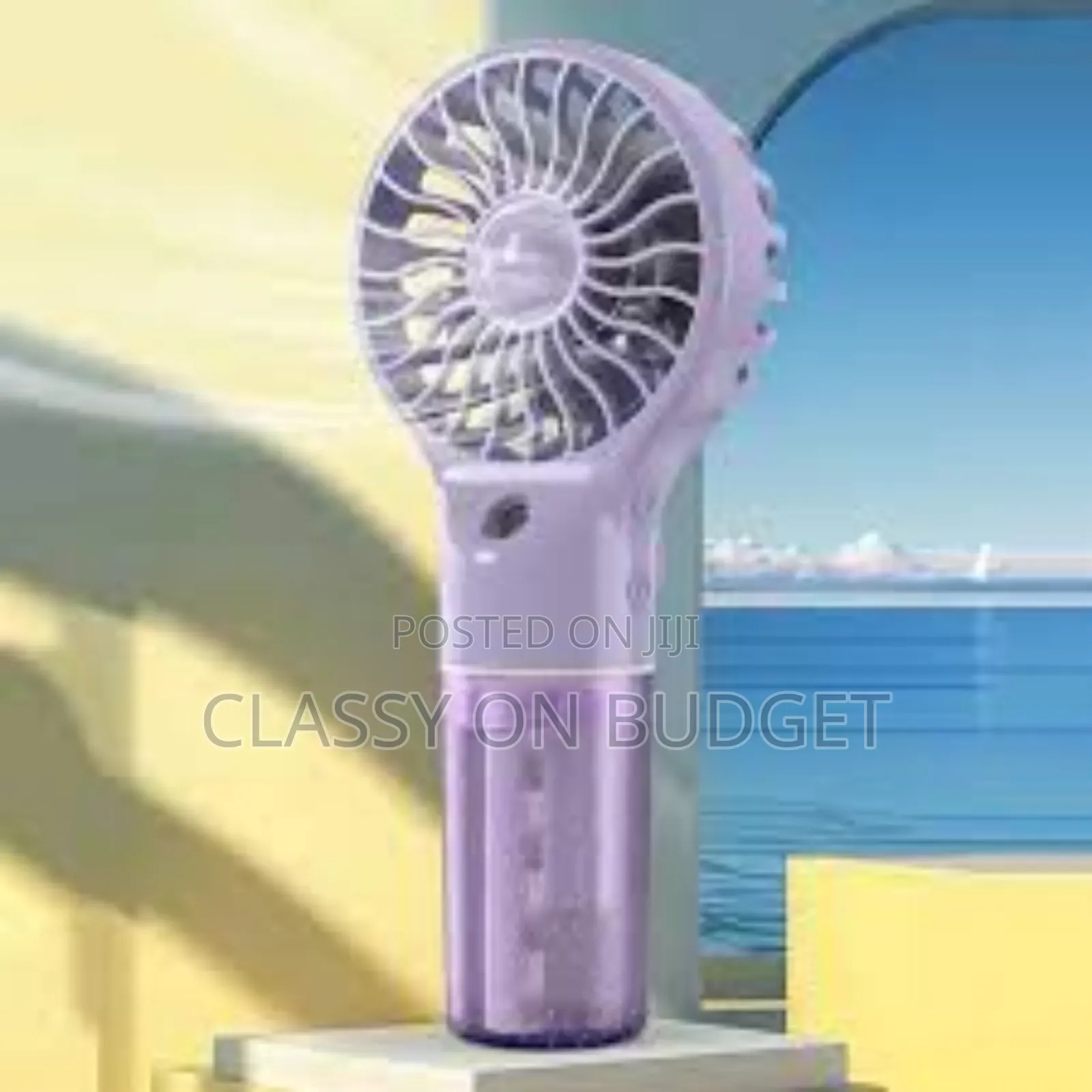 Spray Humidification Mini Handheld Fan.