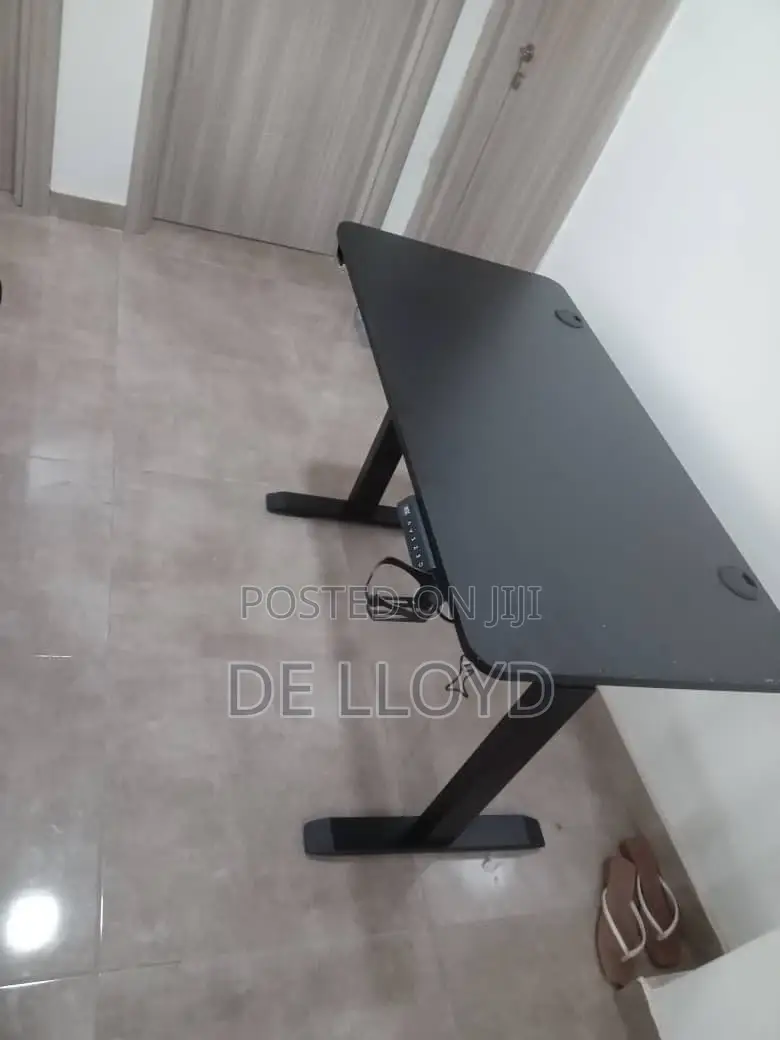 Electric Adjustable Table (140 Cm By 60 Cm )