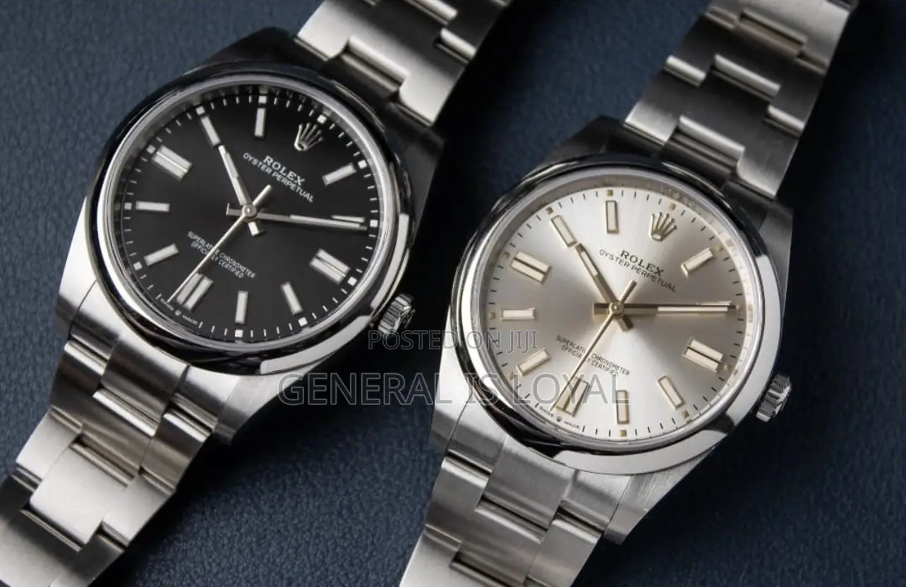 Rolex Oyster Perpetual Watch Red Dial.