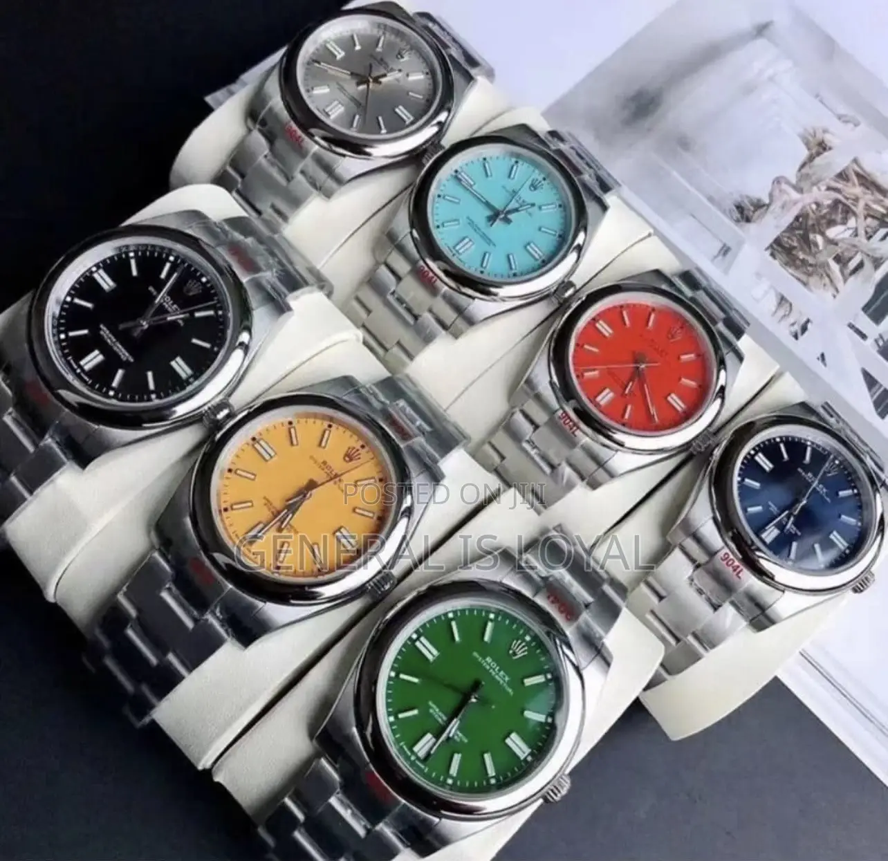 Rolex Oyster Perpetual Watch Red Dial.