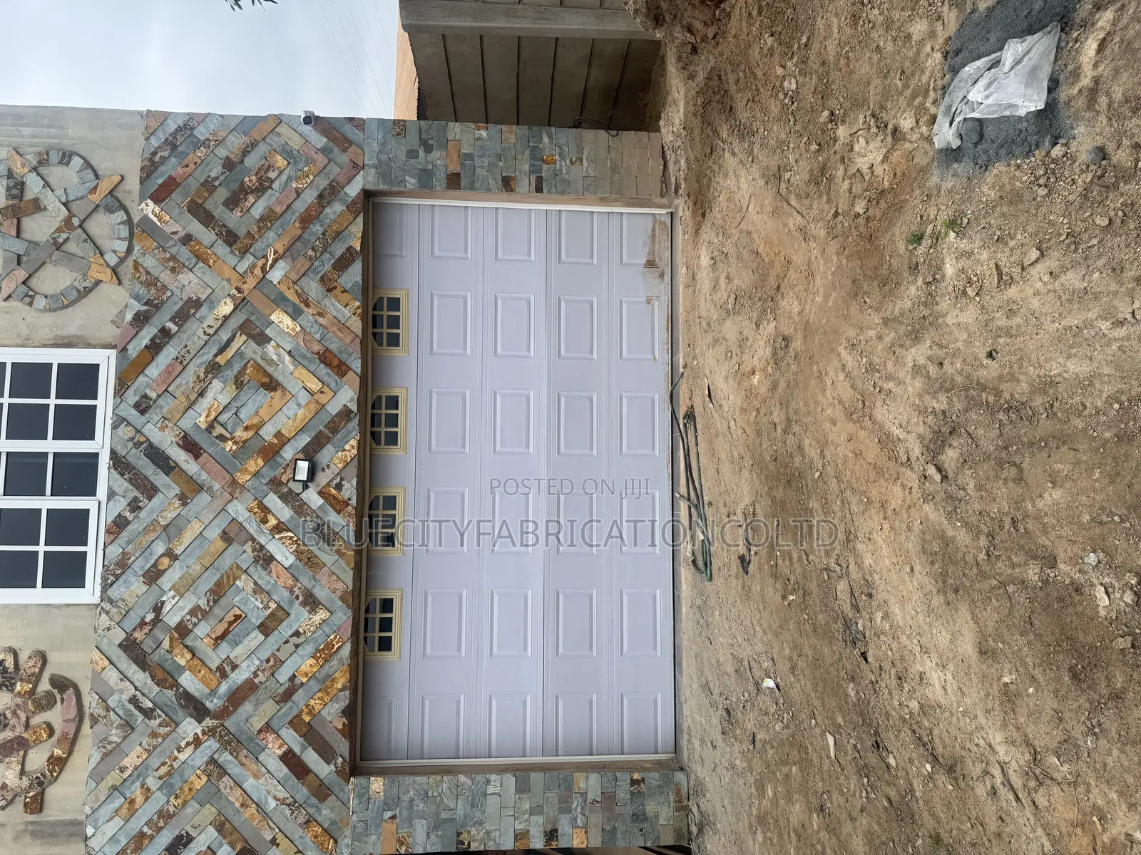 Canadian Automated Garage Door With Fanlight and Remote