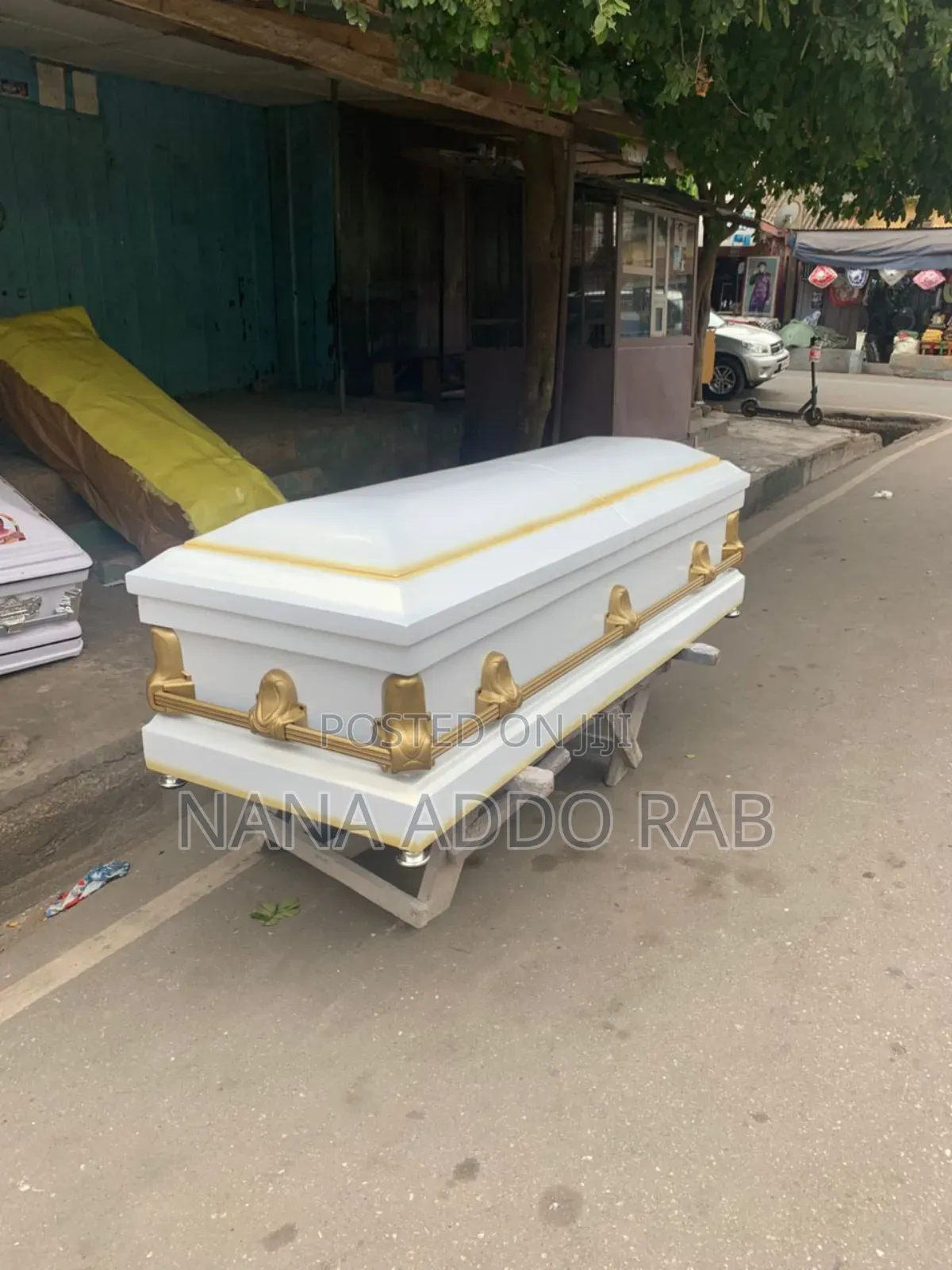 Original Ghana Made Casket .White With Gold Shade on Top of the Casket