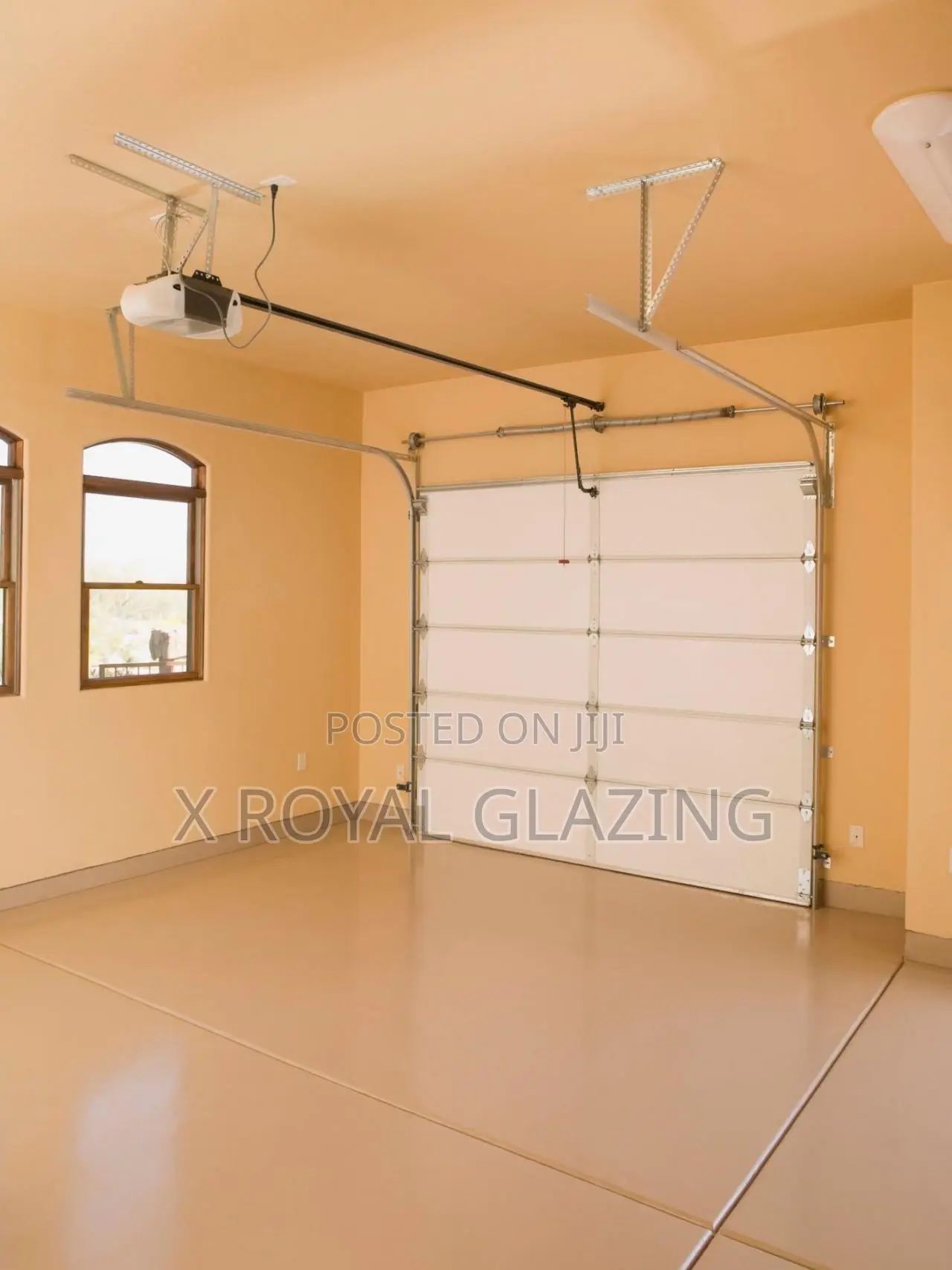 White Modern Remote Control Garage Door Well Installed