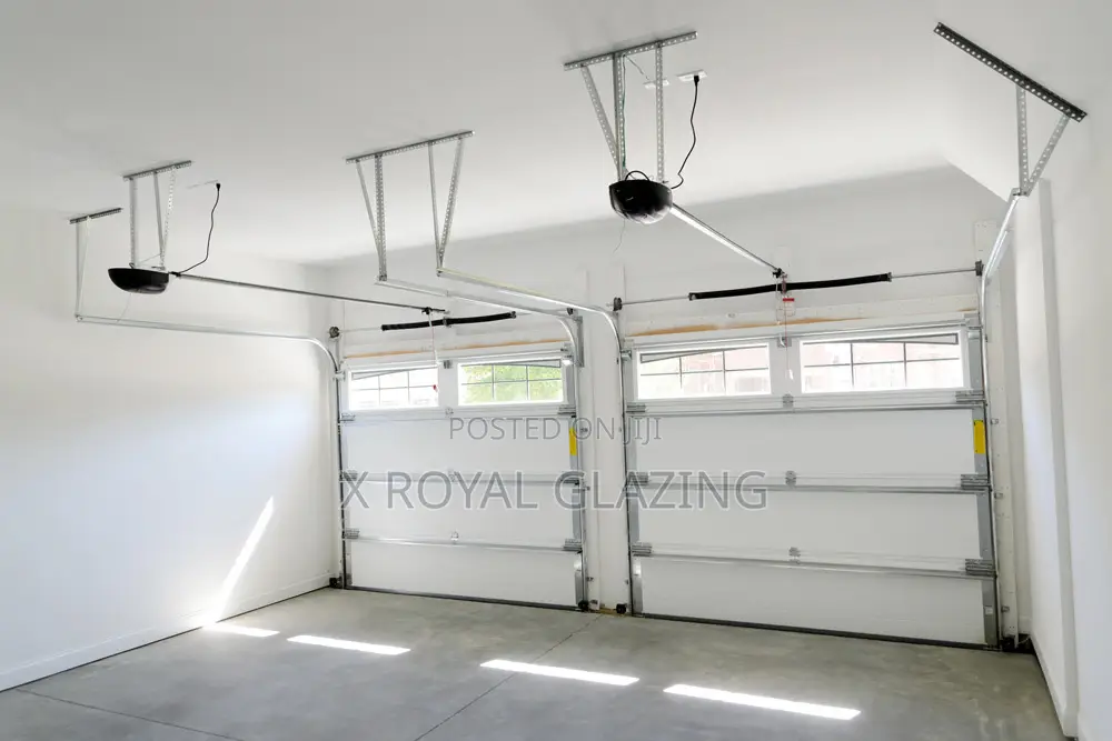 White Modern Remote Control Garage Door Well Installed