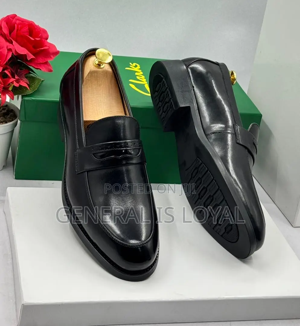 Clarks Men's Black Leather Penny Loafers.