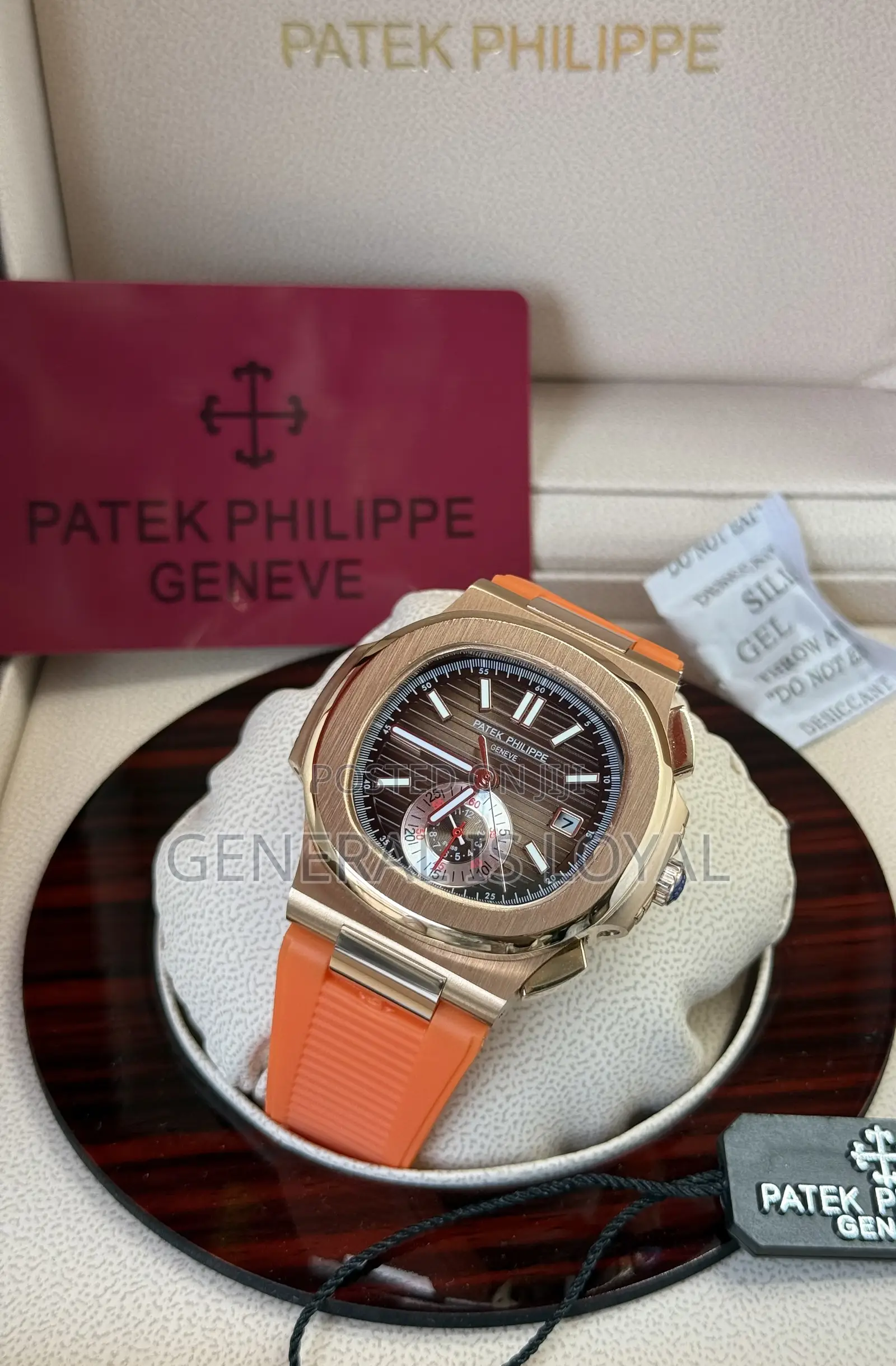 Patek Philippe Nautilus Chronograph Mens Orange Strap Watch