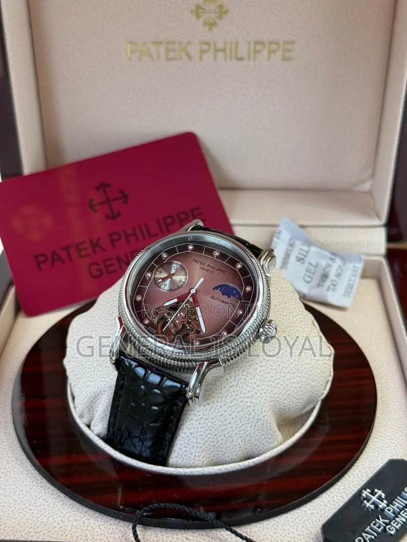 Patek Philippe Automatic Watch With A Brown Leather Strap