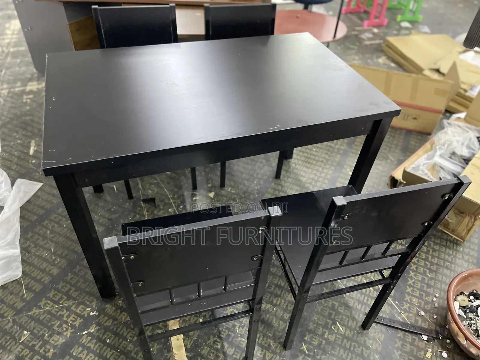 Table With 4 Seats ( Wooden and Black in Color)
