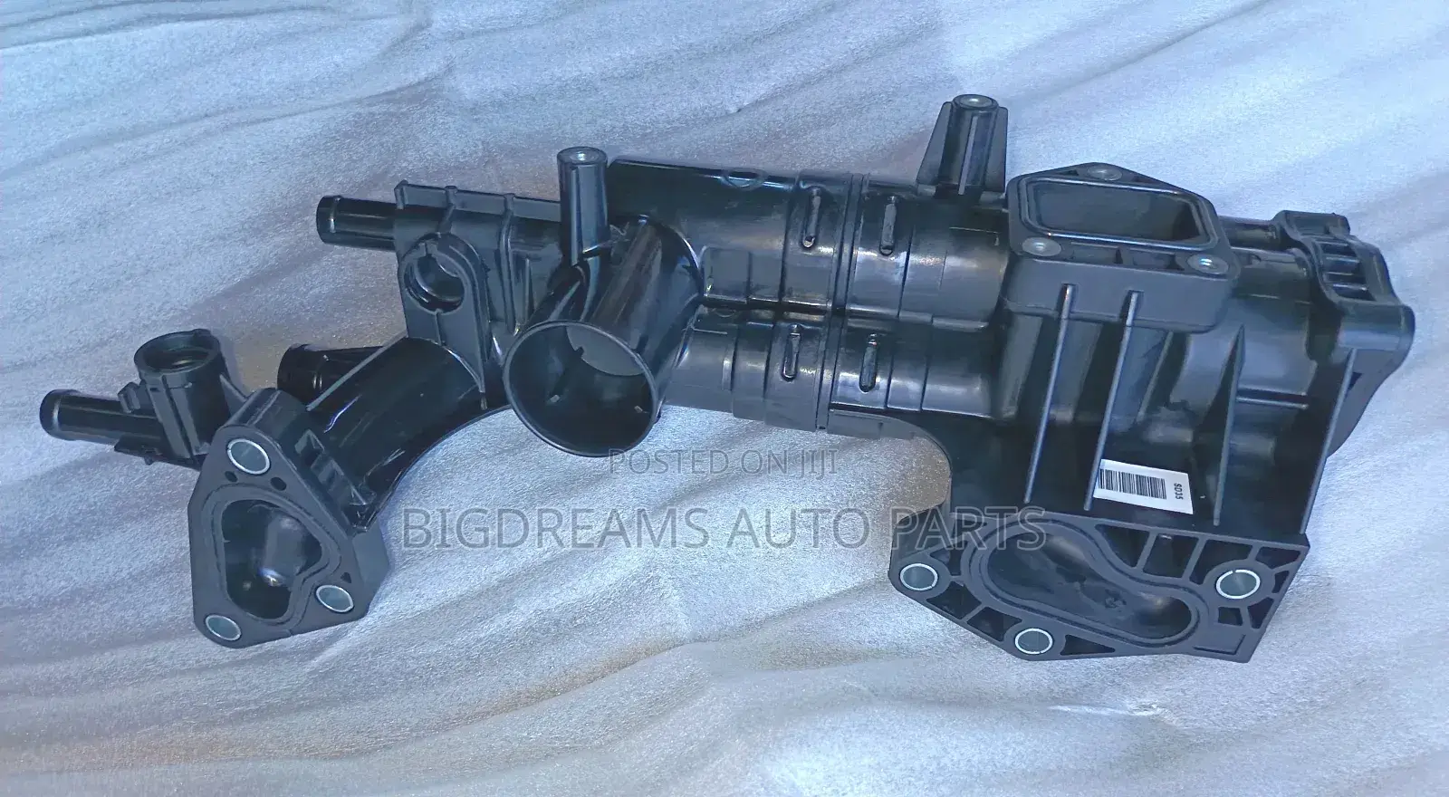 Hyundai/Kia Thermostat Housing.