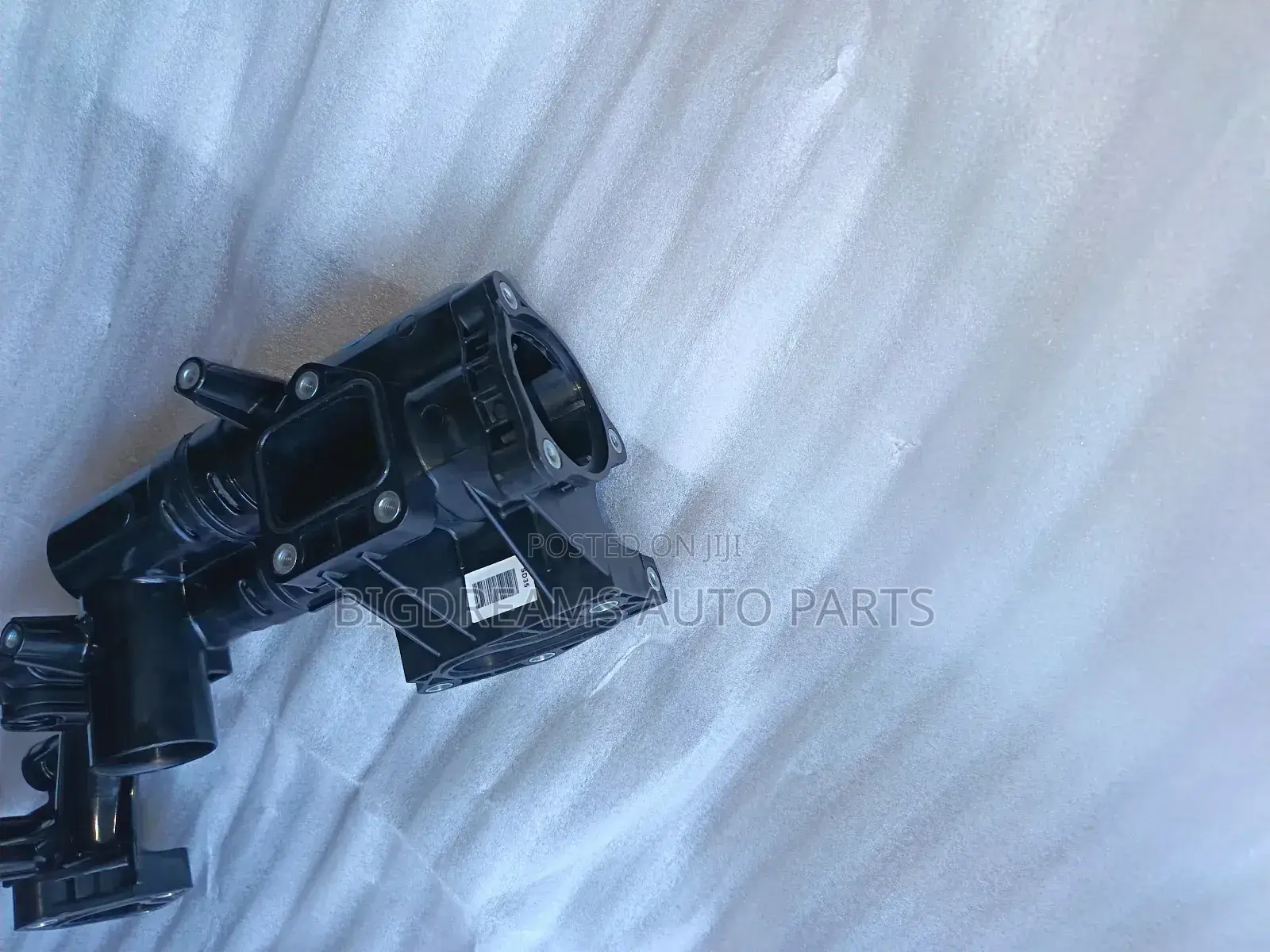 Hyundai/Kia Thermostat Housing.