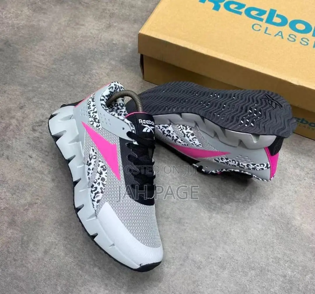 Ladies Wear Reebok Sneakers