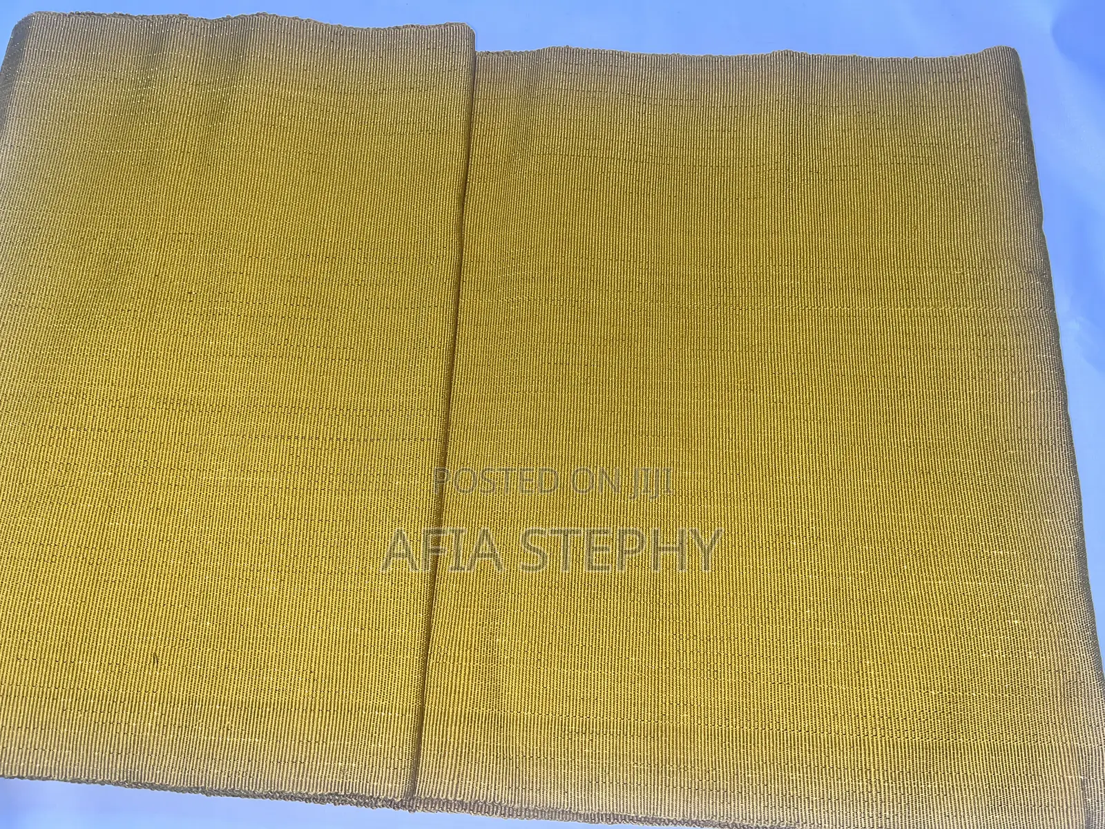 Beautiful 2yards Gold Shimmer Material Kente Available .