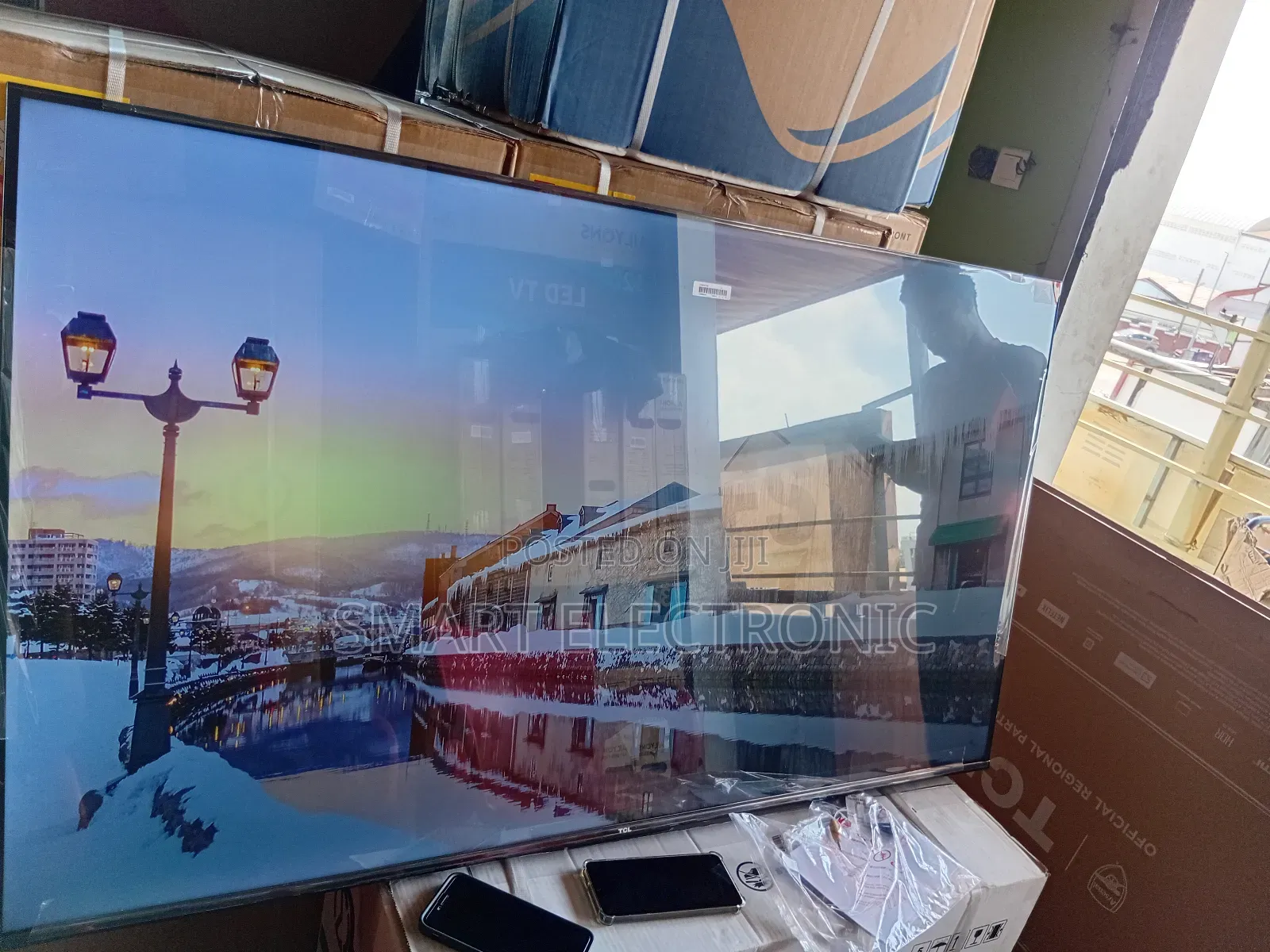 14. “Transform Movie Nights With Tcl’S 65-Inch Qled Tv ”
