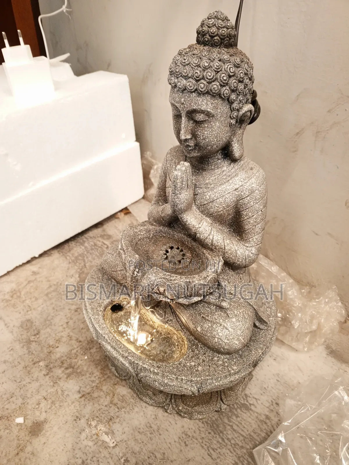 Praying Budda Statue With Light