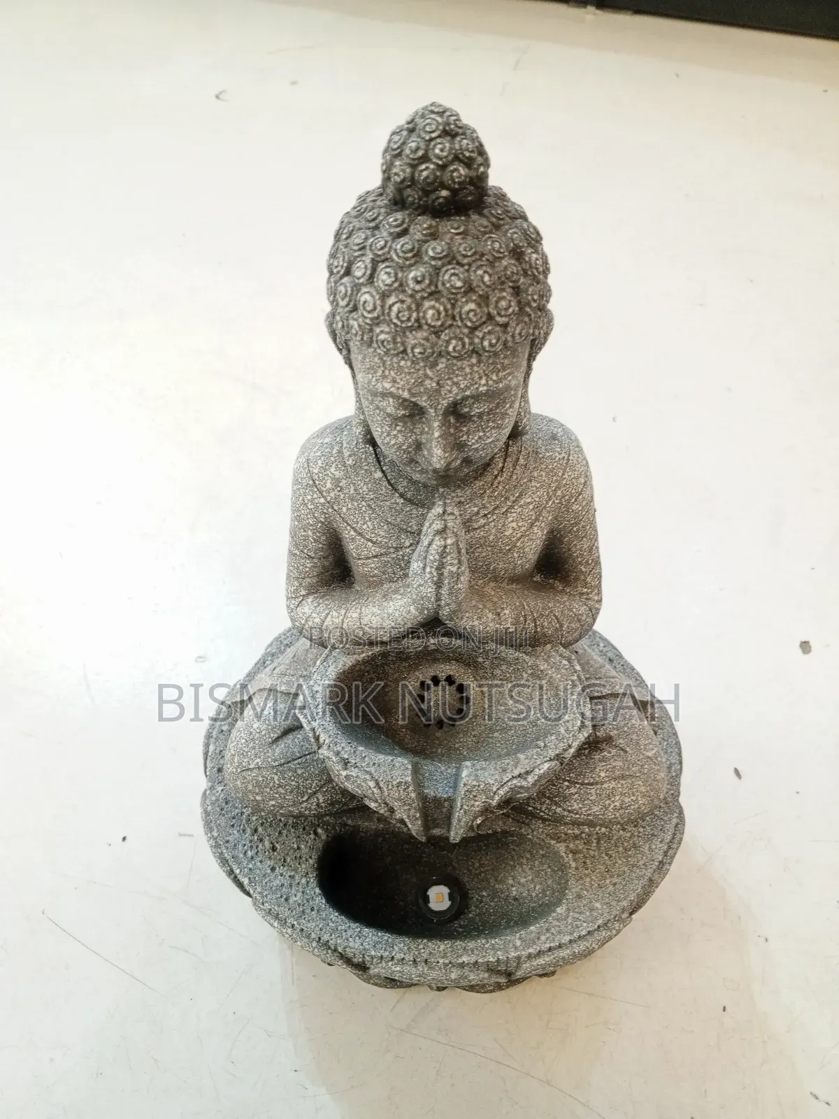 Praying Budda Statue With Light