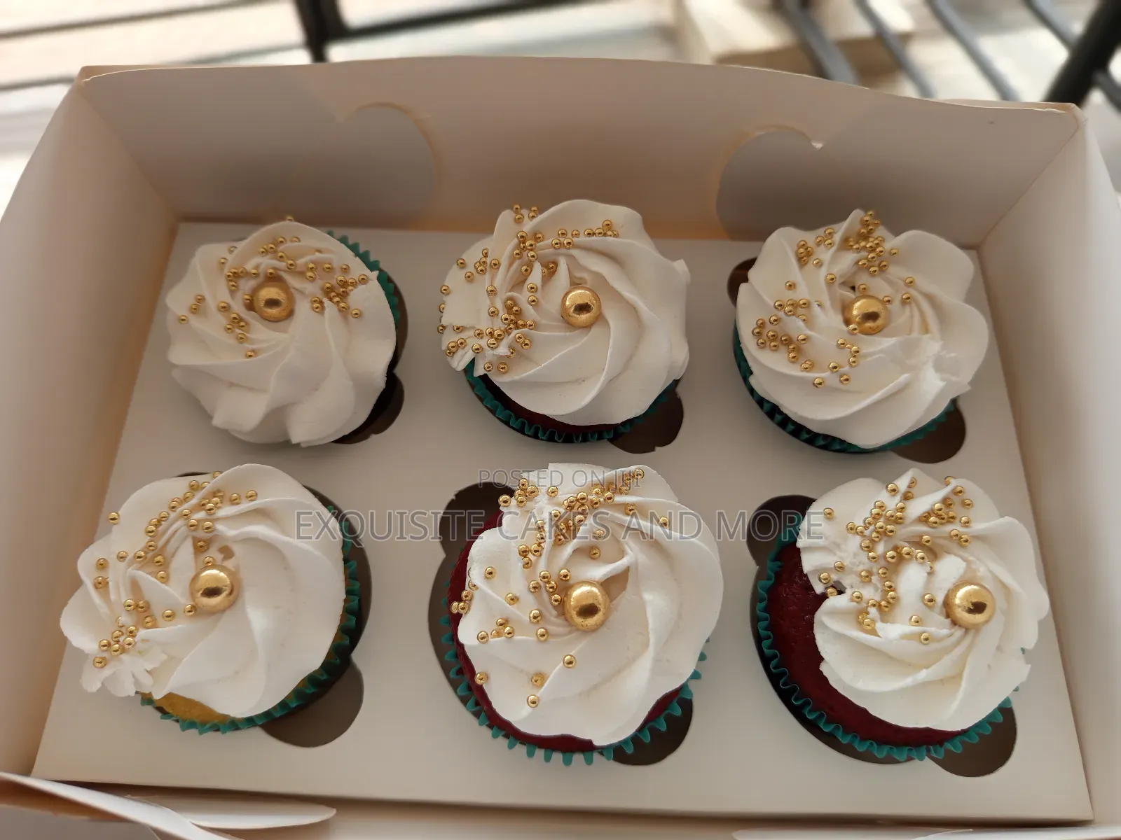 Six Red Velvet Cupcakes With Whipped Cream