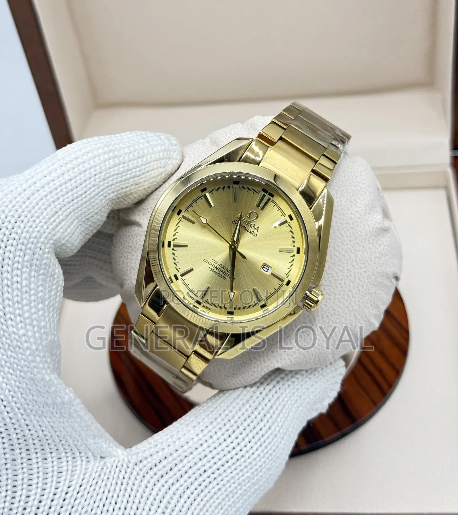 Omega Seamaster Aqua Terra Watch With A Gold-toned Case, Dial,