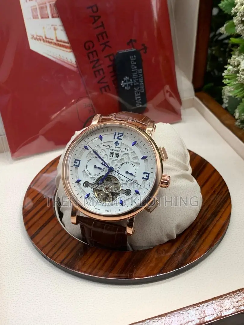 Patek Philippe Brown Leather Automatic Watch With White Surface
