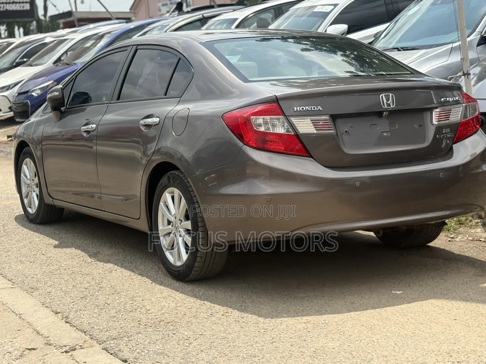 Honda Civic EX-L 2dr Coupe (1.8L 4cyl CVT) 2014 Gold