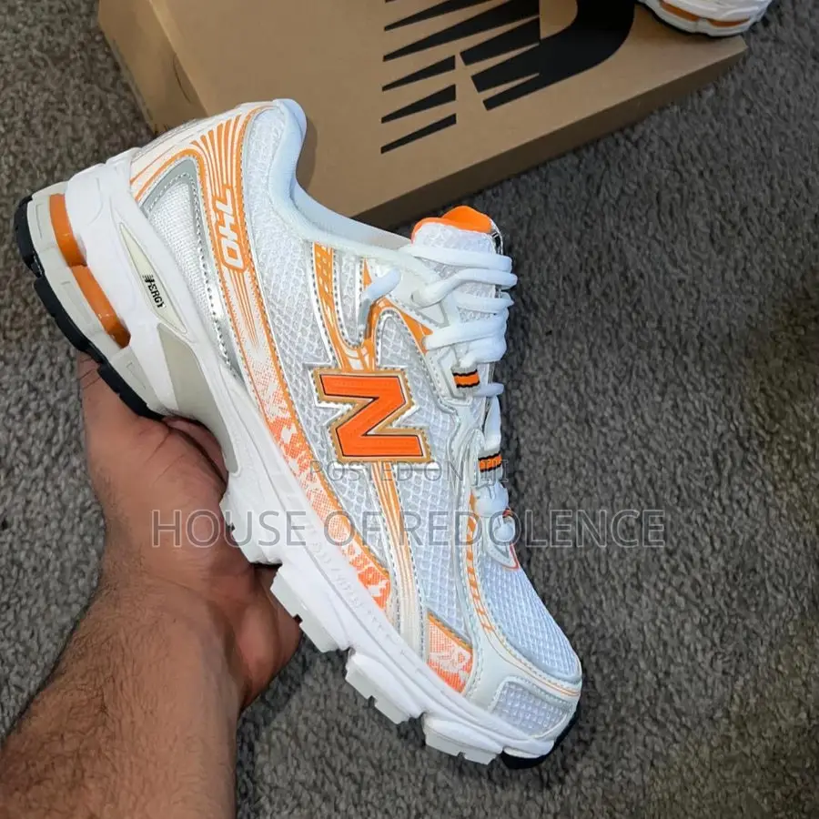 New Balance 740 Orange White Sneakers