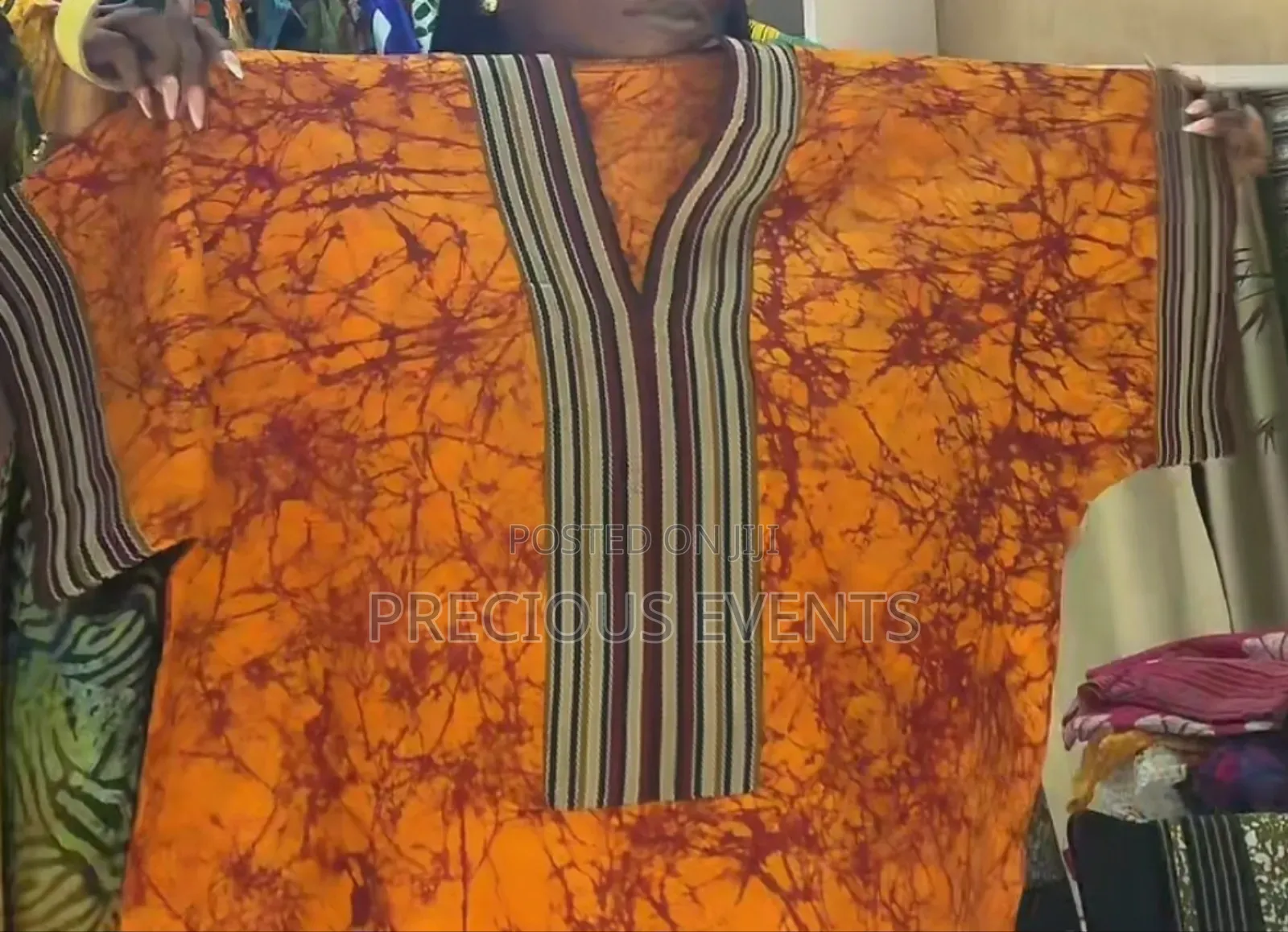 Traditional African Wears Feather And Beads.