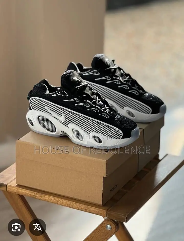 Drake’S Nike Nocta Glide Black/White Sneakers