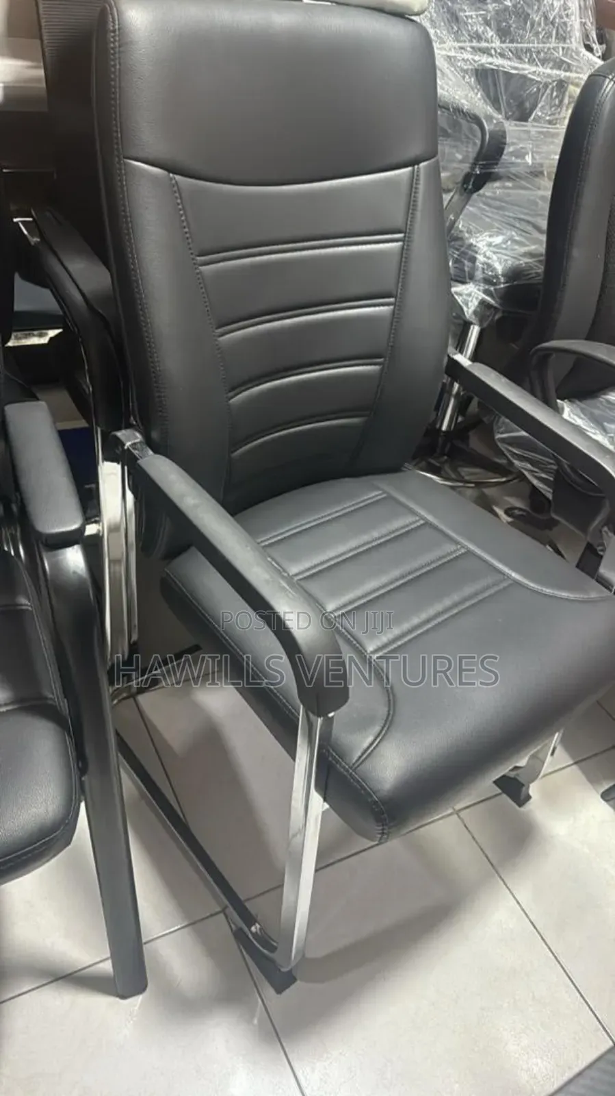 Modern Black Leather Visitor's Chair.