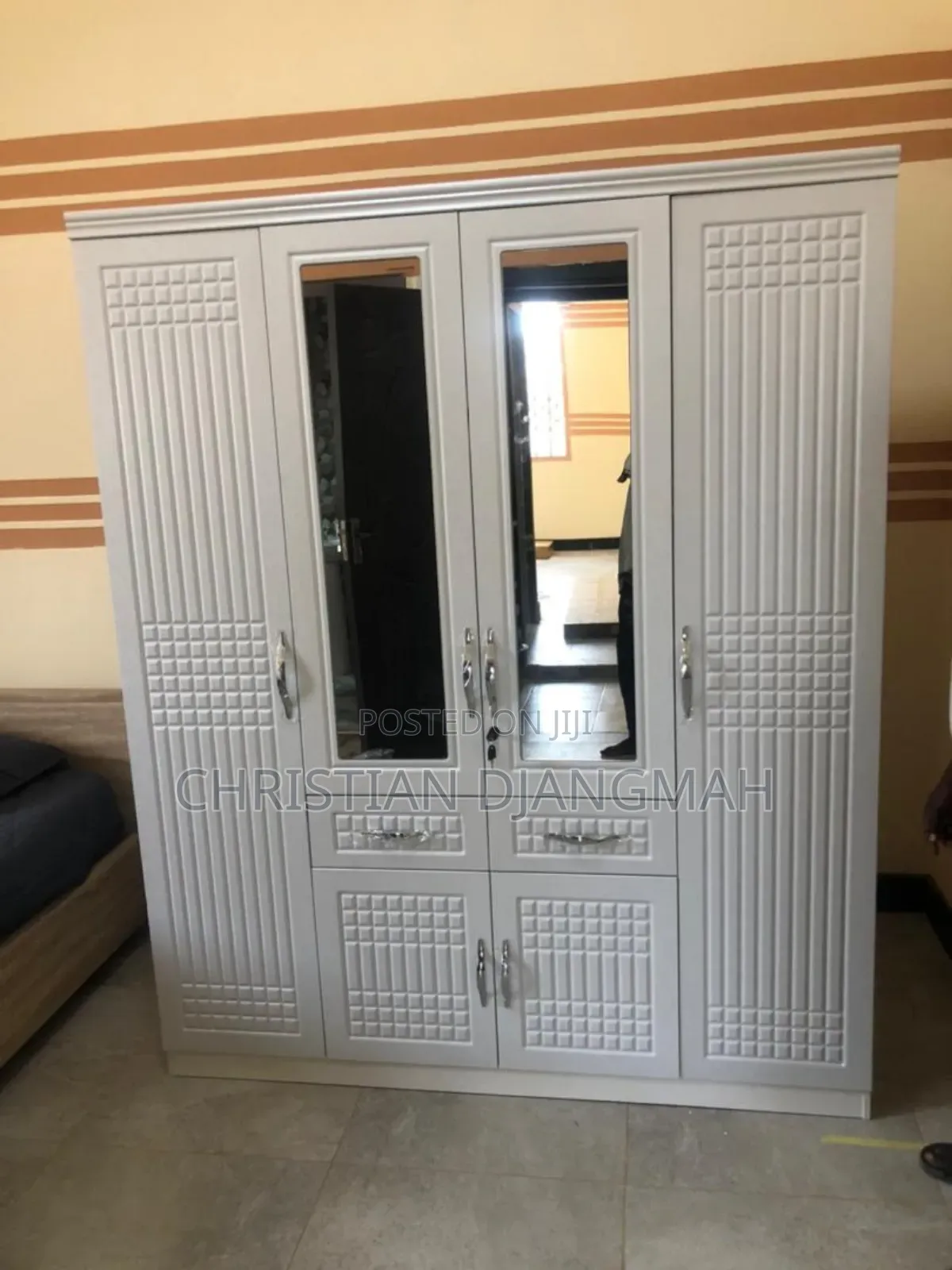 Ultra Modern Four Door Foreign Wardrobe.