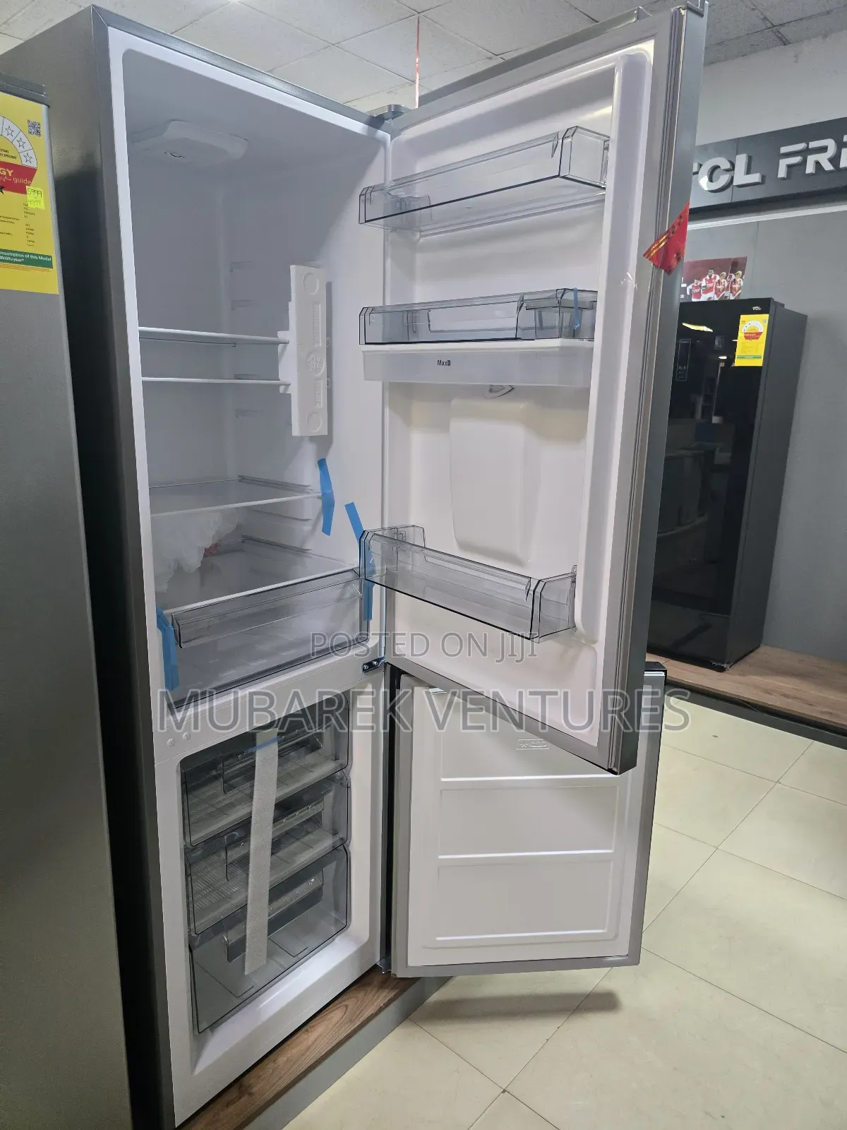 TCL 309l Bottom Freezer Fridge With Dispenser
