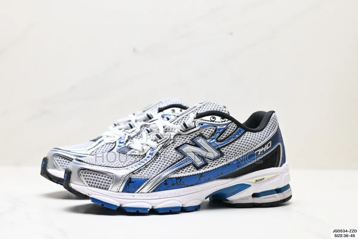 New Balance 740 in White Blue Colorway Sneakers