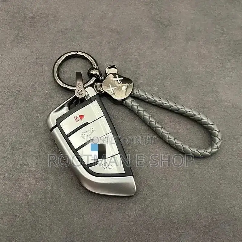 Braided Leather Keychain With a Teddy Bear Head for Car and Bag Keys