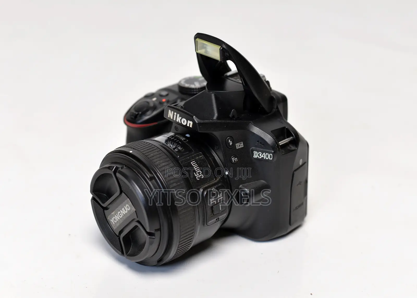 Nikon D3400 (Low Shutter Count) + Yongnuo 35mm F/2 Prime Lens