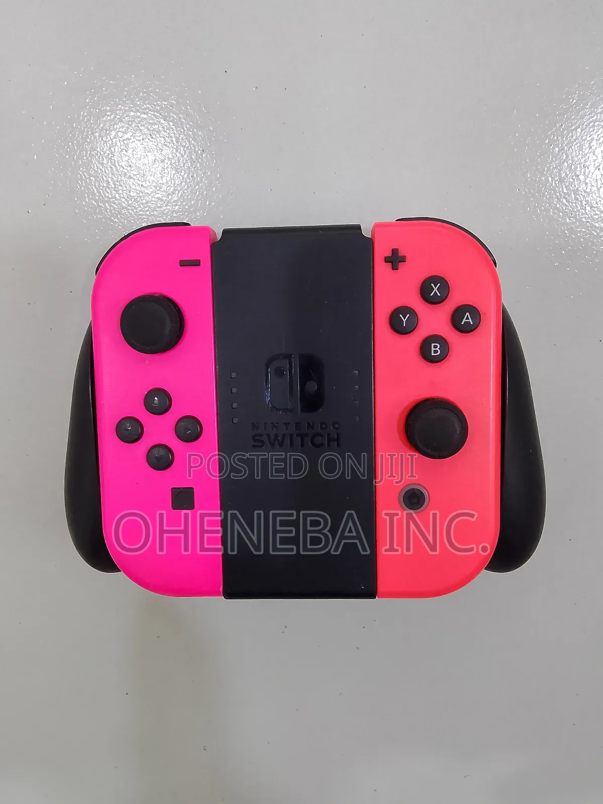 Nintendo Switch Joy-Cons + Holder