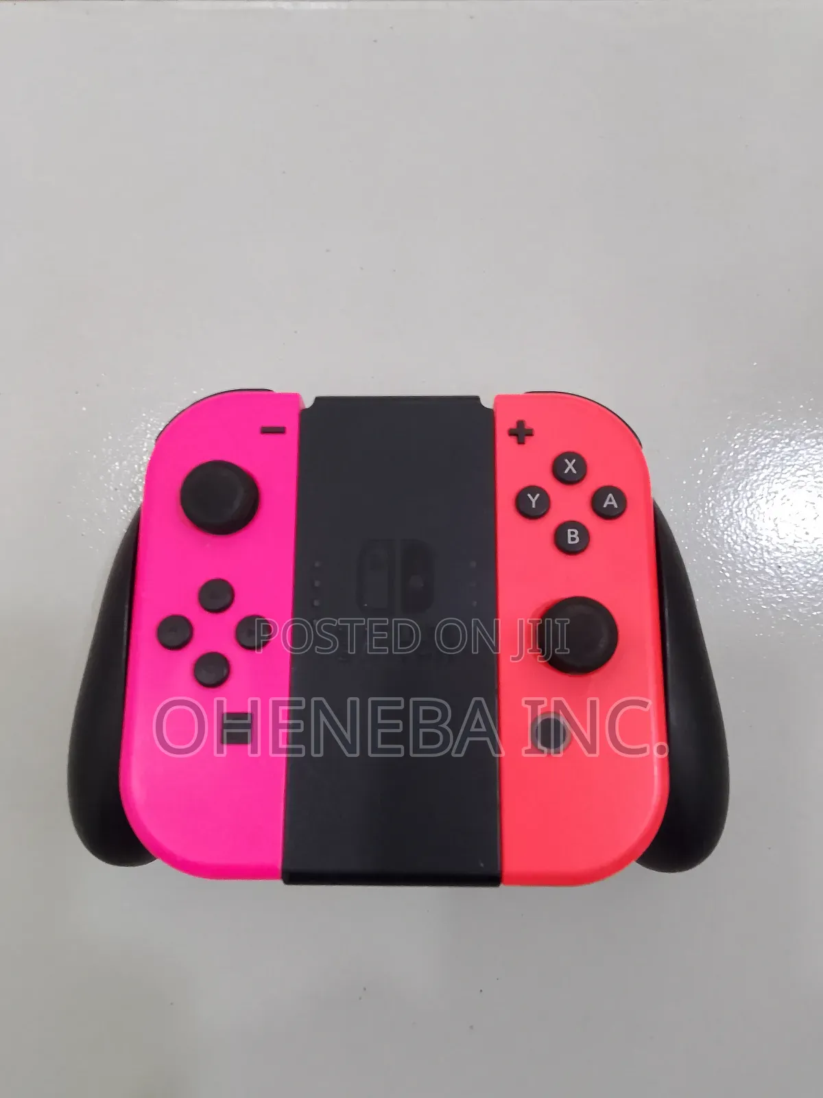 Nintendo Switch Joy-Cons + Holder