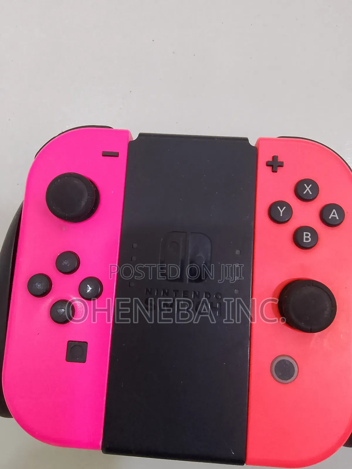 Nintendo Switch Joy-Cons + Holder