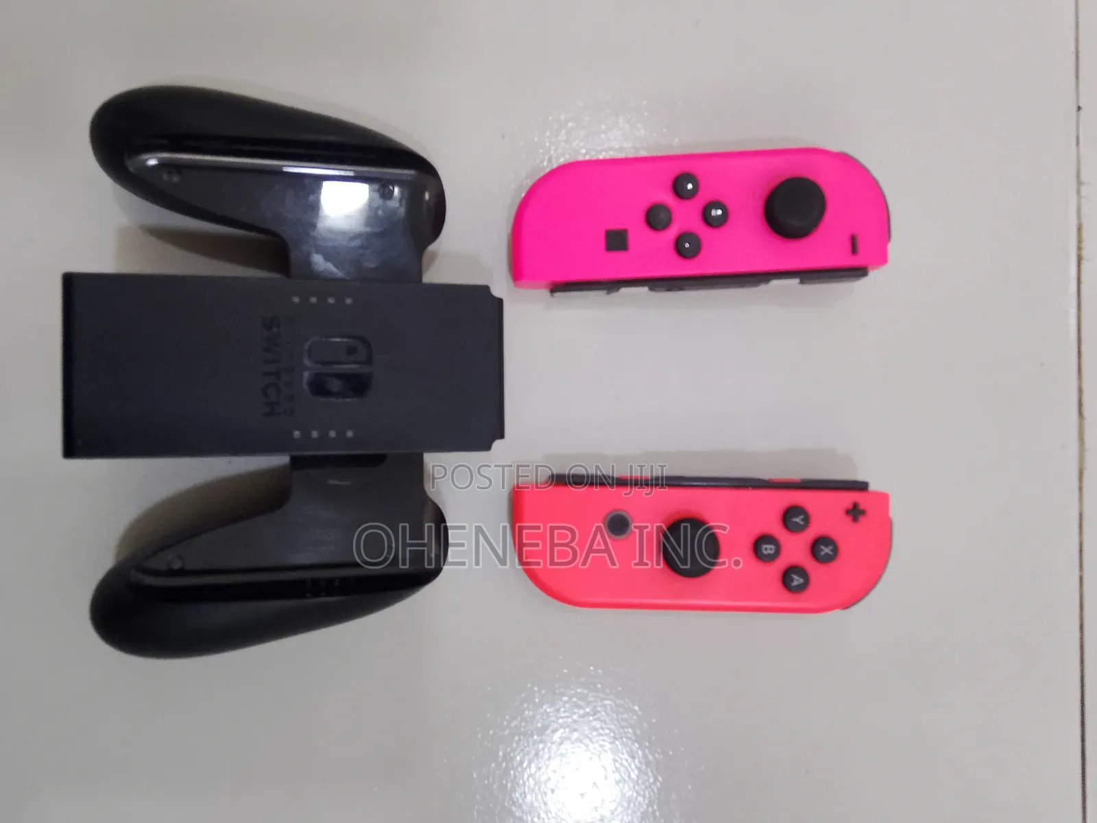 Nintendo Switch Joy-Cons + Holder